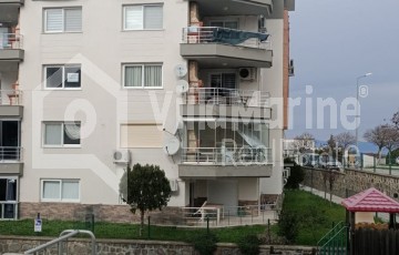 3+1 FLAT WITH PARTIAL SEA VIEW ON A SITE WITH POOL...