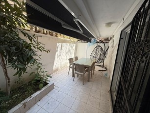 Appartement 2+1 en centre-ville, à distance de marche de la plage