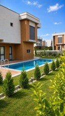 Villa neuve 3+1 à 600 mètres de la mer, en zone côtière