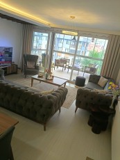 Appartement 3+1 dans un complexe avec commodités sociales et vue sur la mer à Kuşadası