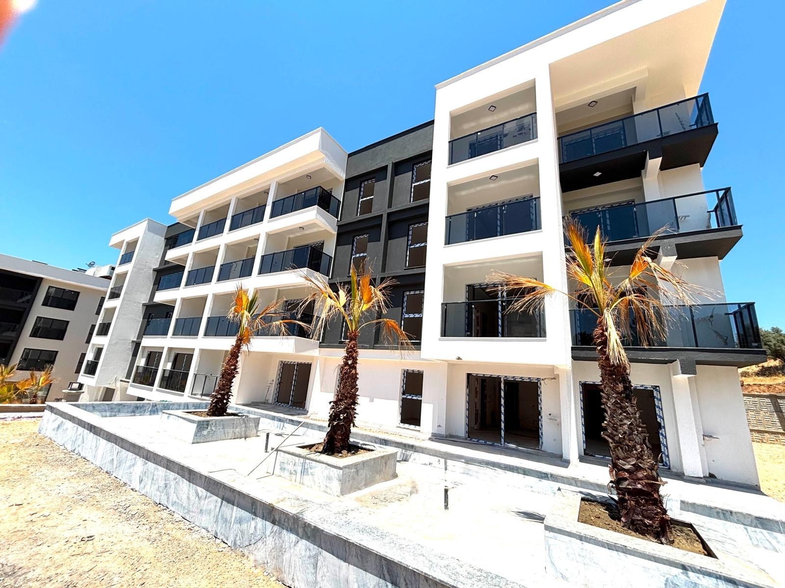 1+1 Apartment with a Sea View within a Residential Complex